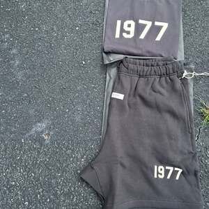 Fear of God Essentials 1977 Iron Sweat Shorts